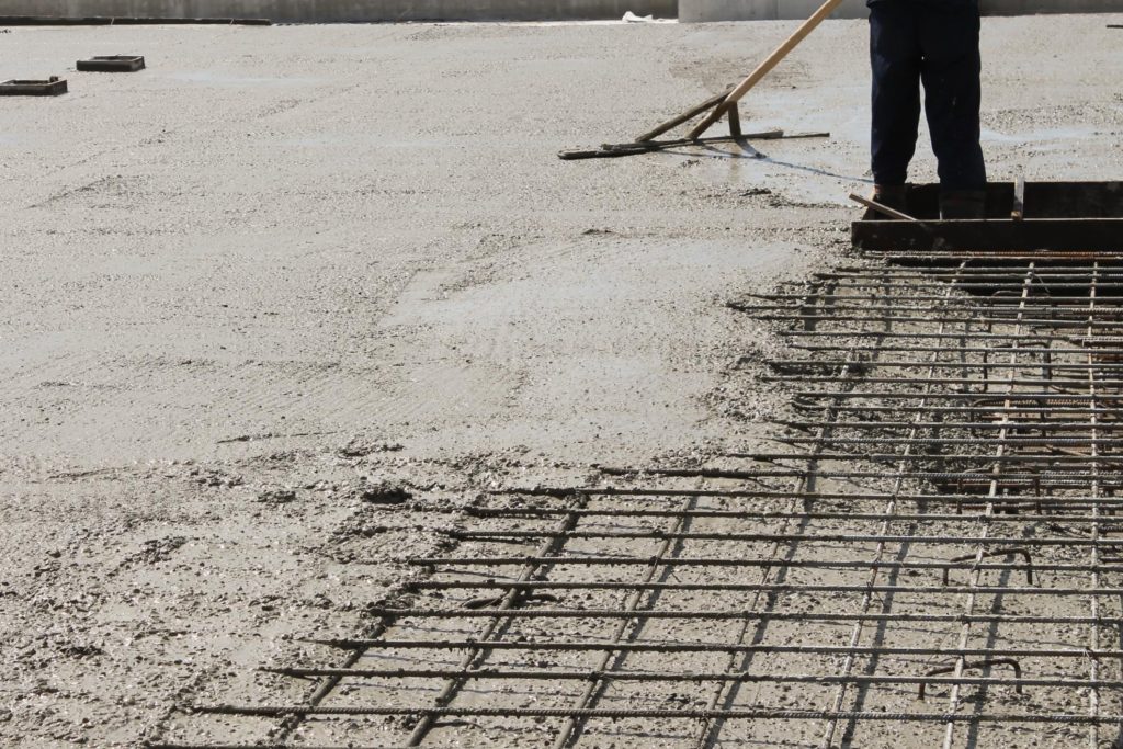 professional contractor working on concrete pouring