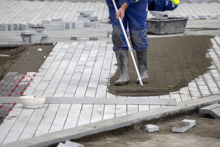 professional contractor working on masonry construction